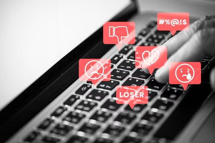 Negative online comments and harassment symbols appearing over a keyboard, representing persistent harmful content on the internet.